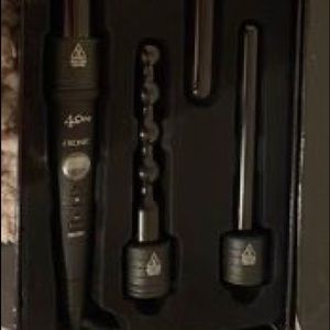 Ikonic clique interchangeable curl wand still in box.